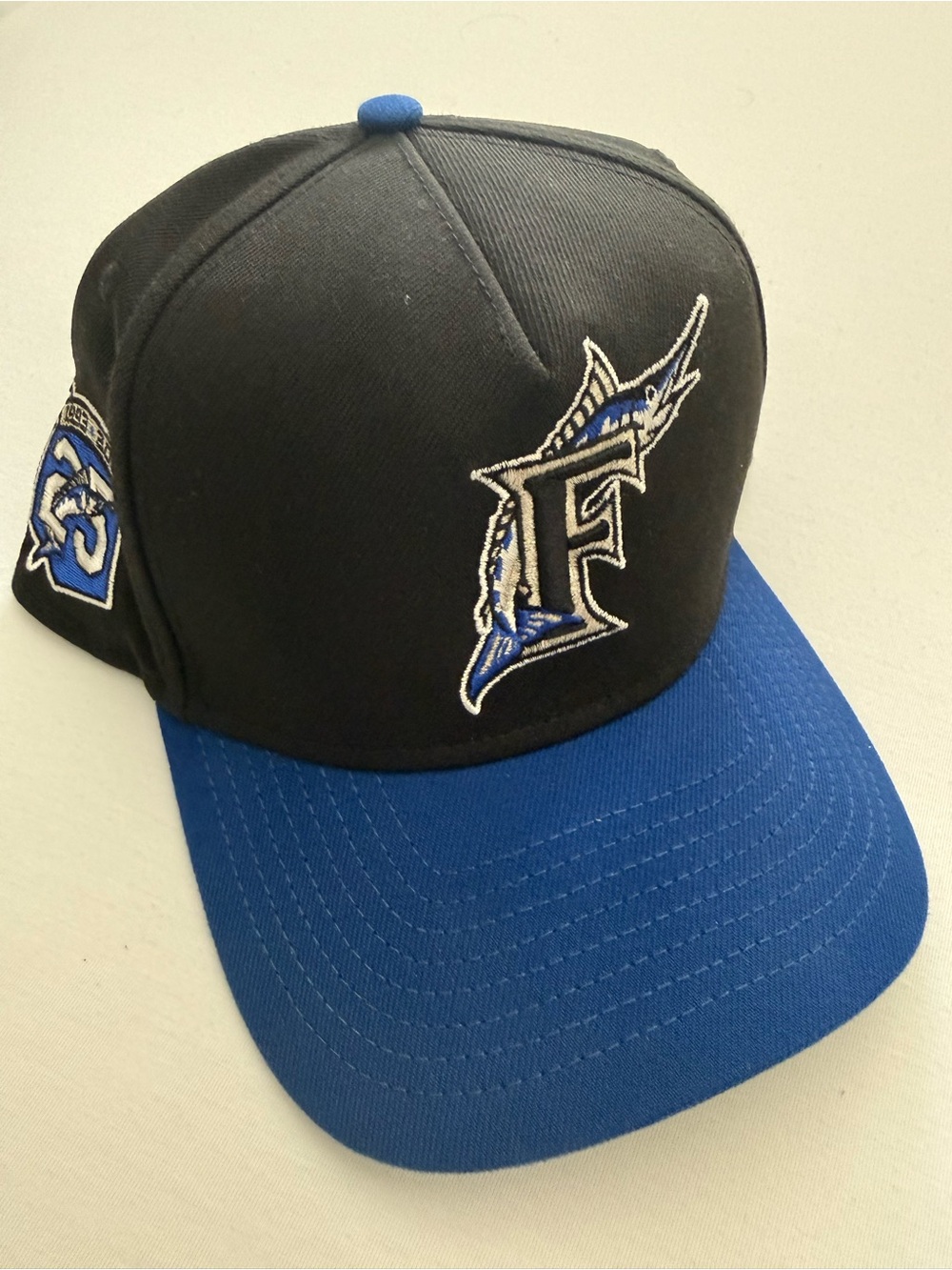 New Era Black and Royal Blue Marlins F Logo Baseball Cap